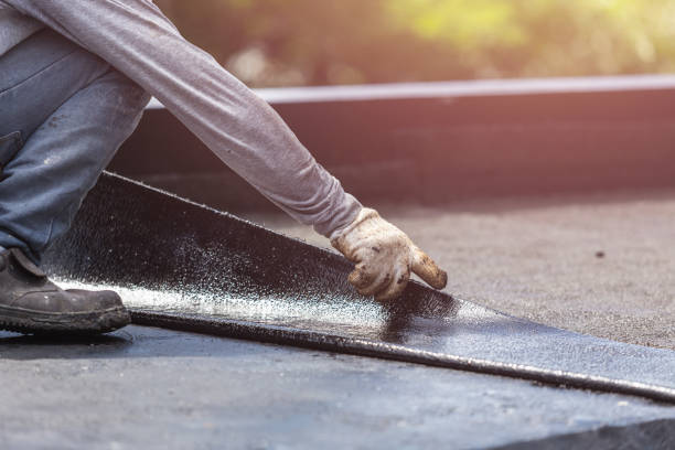 Professional Basement Waterproofing technician working in Junction City, WI